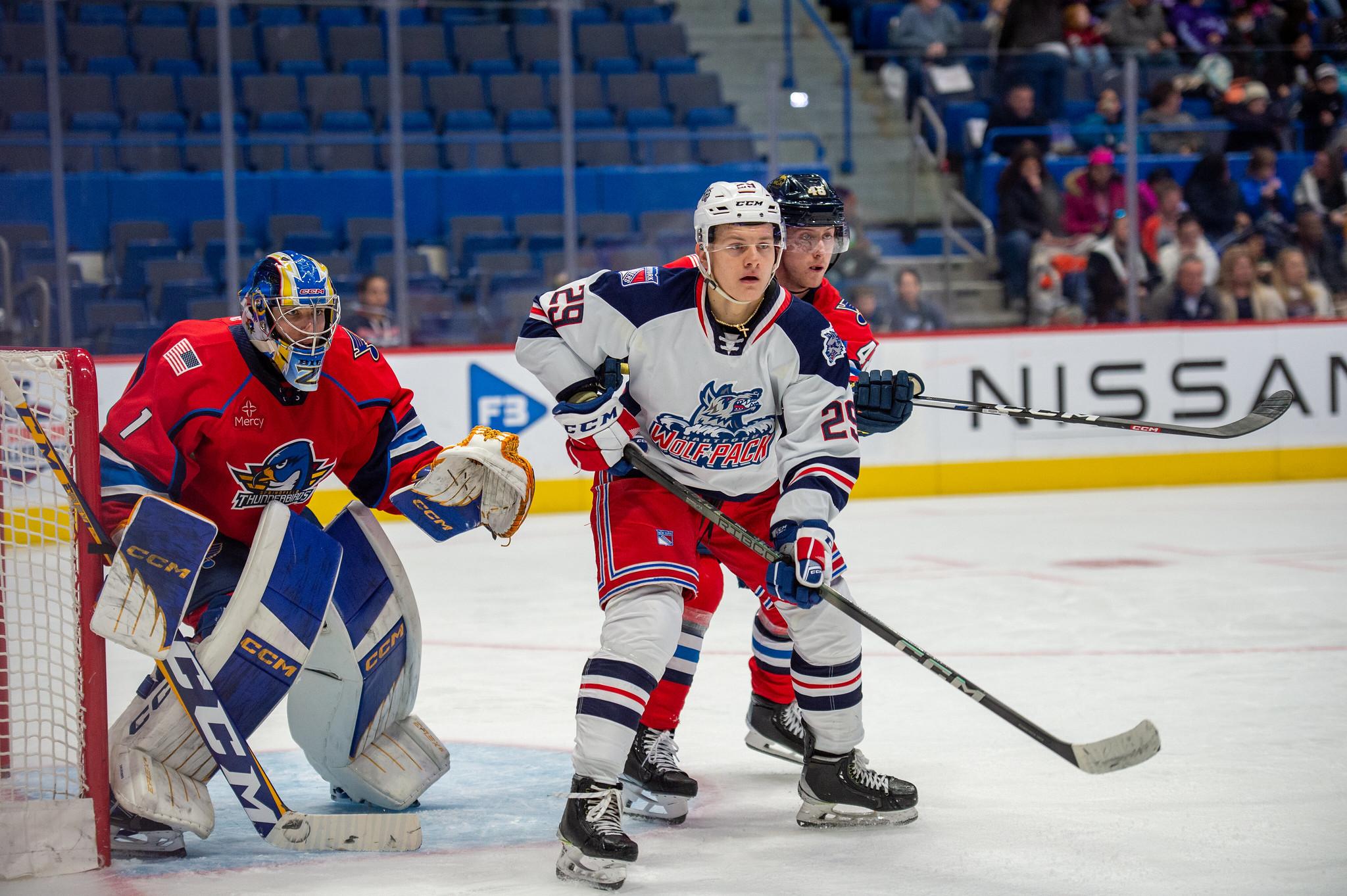 Adam Sykora skating with the puck during a Rangers prospect game against the Thunderbirds.