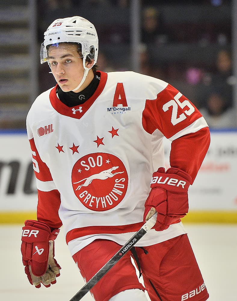 Chase Reid wearing Soo Greyhounds jersey number 25 during hockey game