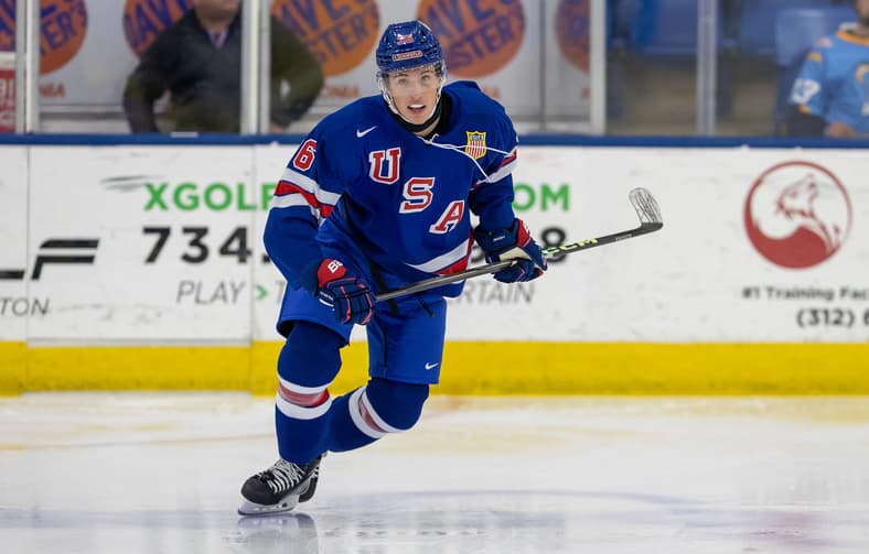 Gabe Perreault skating with the puck during a USA Hockey game