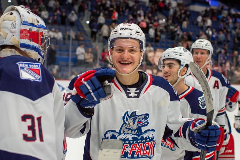 Rangers players celebrate during a game at Madison Square Garden