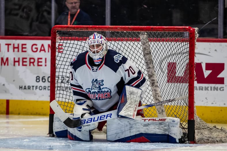 Hartford Wolf Pack goaltender in net during game action
