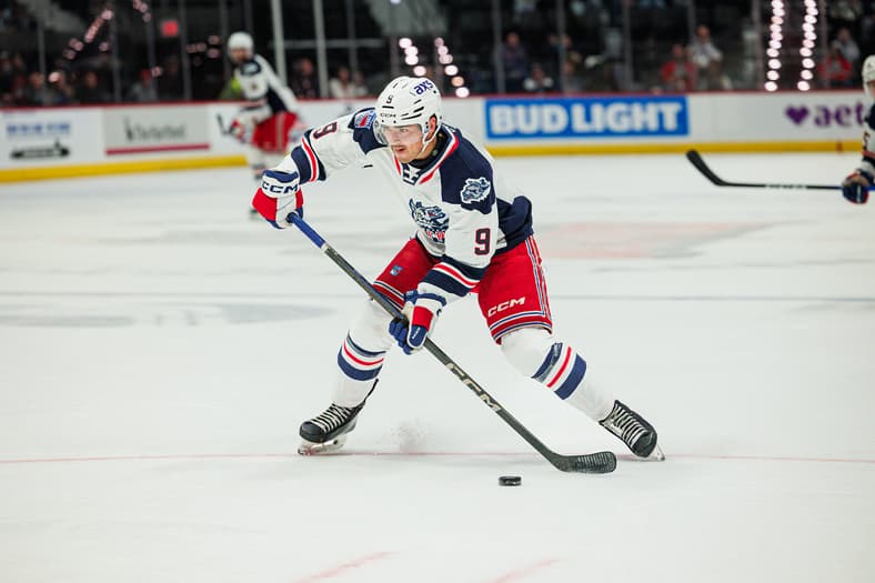 Brett Berard skating with the puck during a Hartford Wolf Pack game