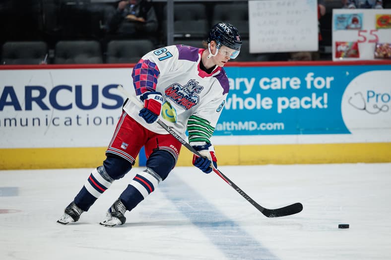 Brody Lamb skating with the puck during a Hartford Wolf Pack game