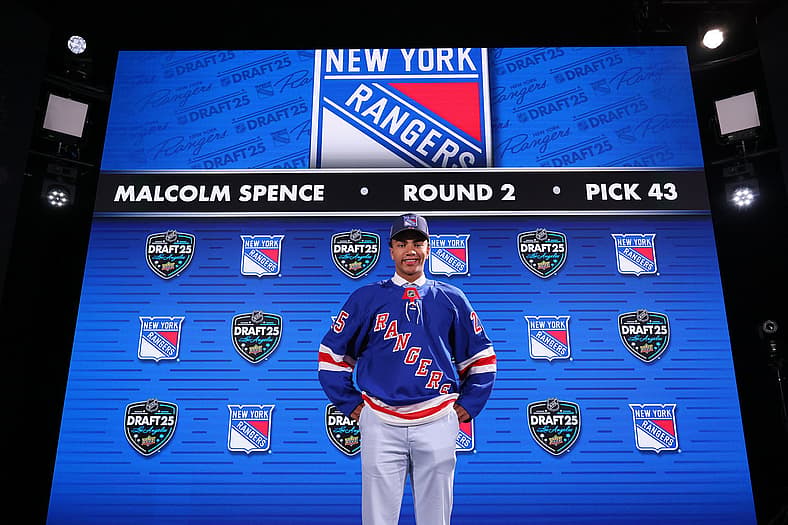 Malcolm Spence at the 2025 NHL Draft wearing a New York Rangers jersey