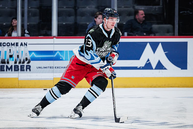 Bryce McConnell-Barker skating with the puck during a Hartford Wolf Pack game