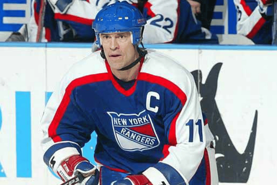 New York Rangers player wearing blue alternate jersey with captain's C